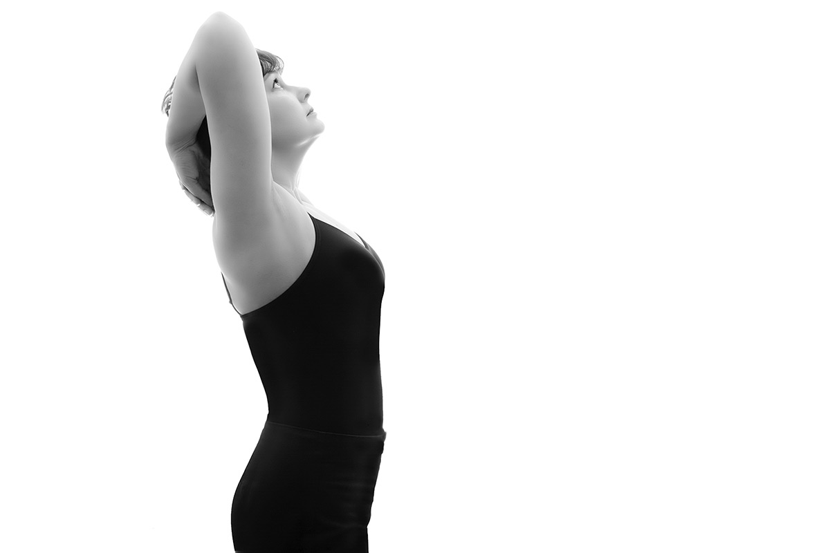 Model portrait against a white background.