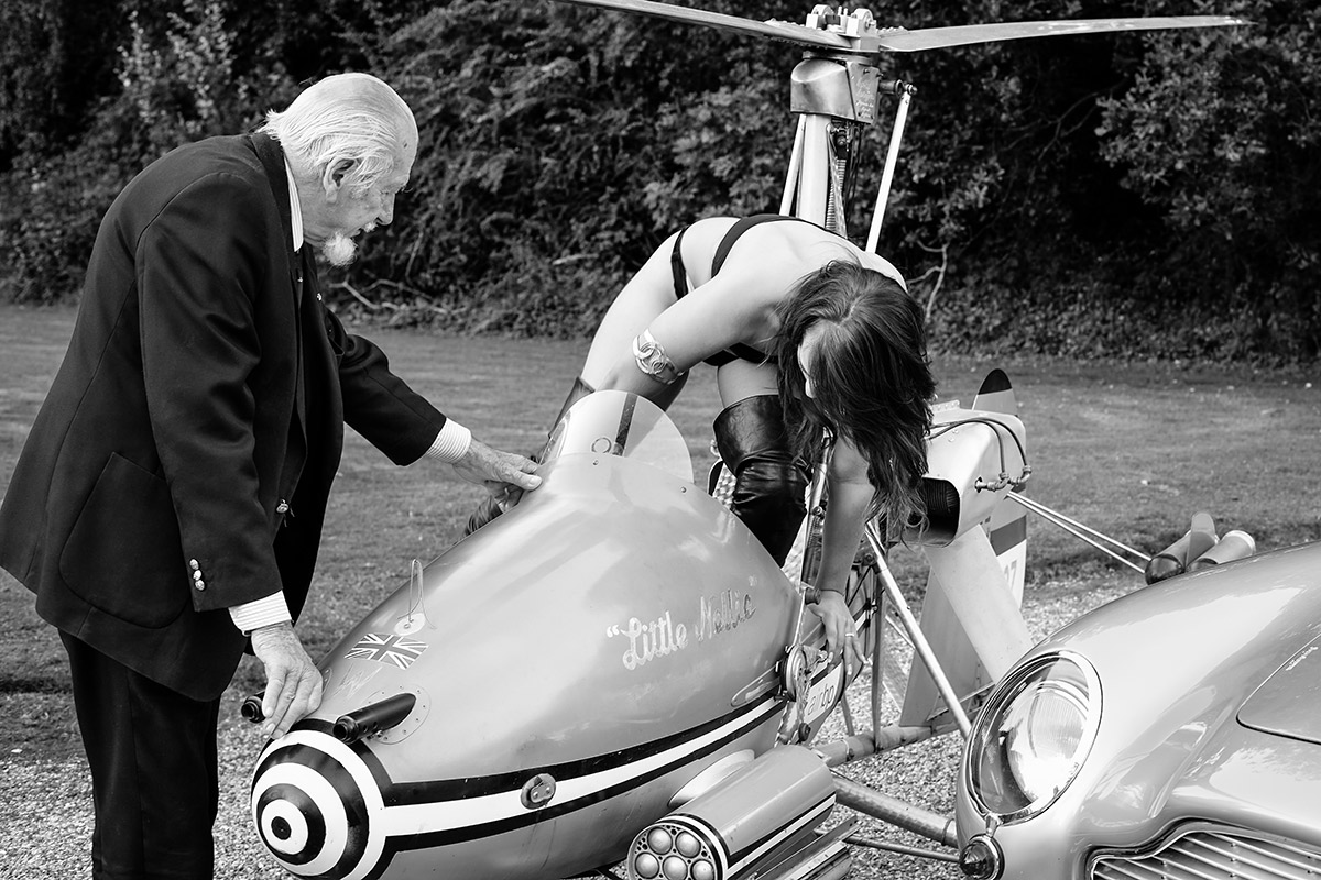 Wing Commander Ken Wallis helping model into Little Nellie.
